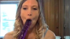 She takes a huge dildo in her ass