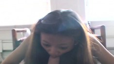Seductive Asian schoolgirl reveals her sweet body and blows a big dick