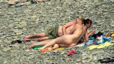 Nude girl picked up by voyeur cam at nude beach
