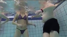 Teen Gives Handjob In Public Pool