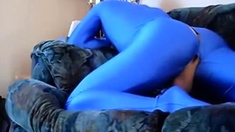dude in mask a blue zentia suit strokes his big cock